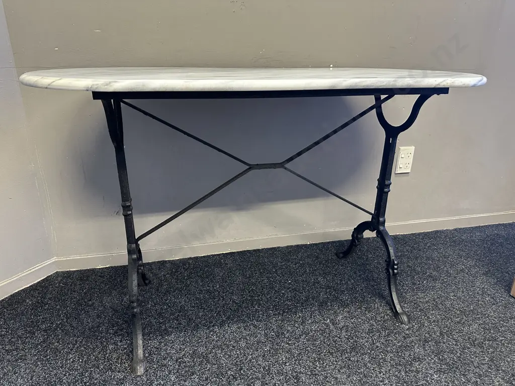 French Bistro Table With Painted Wrought Iron Base and Oval Marble Top H73, L120, D60cm. Image 1++